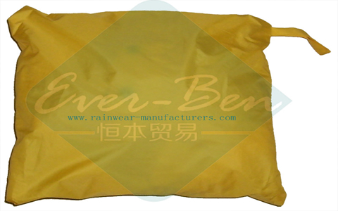Yellow rain poncho rain gear packing bag